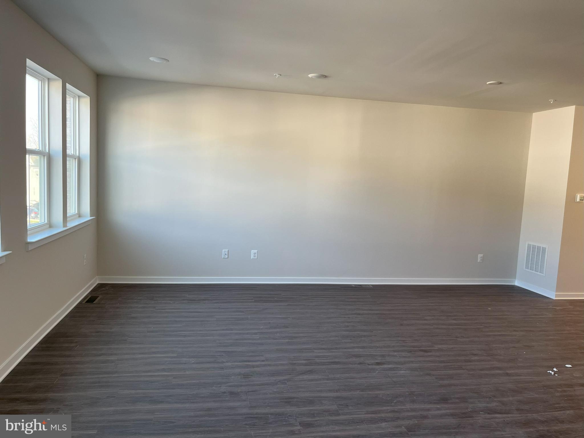 45 Four Leaf Drive Downingtown, PA 19335 - Photo 11 of 16 a view of an empty room with wooden floor and a window