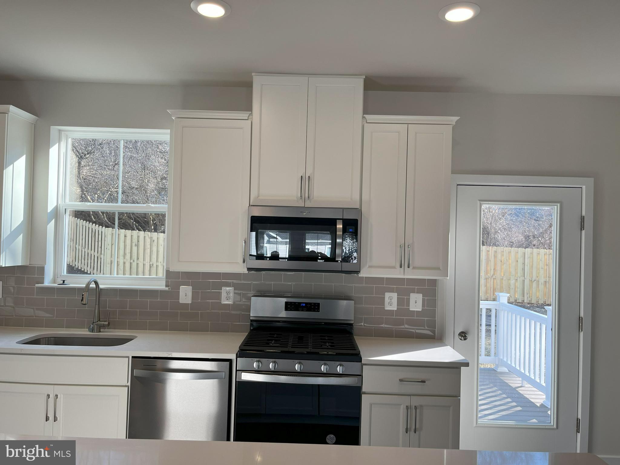 45 Four Leaf Drive Downingtown, PA 19335 - Photo 2 of 16 a kitchen with white cabinets and appliances