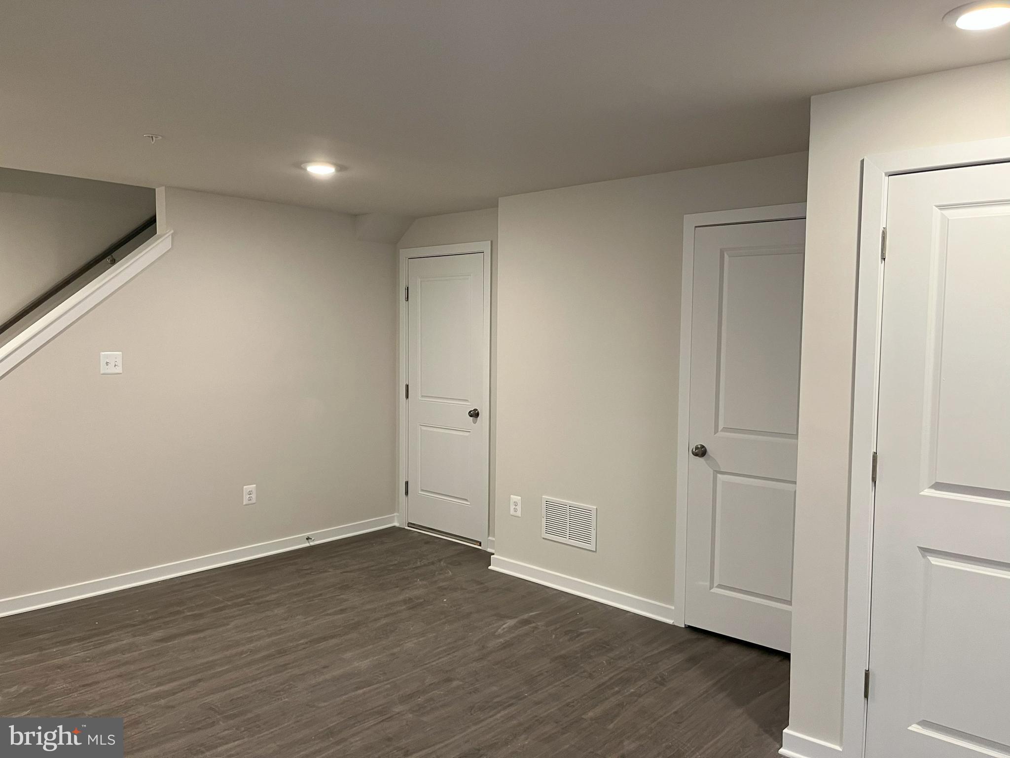 45 Four Leaf Drive Downingtown, PA 19335 - Photo 4 of 16 a view of an empty room with wooden floor