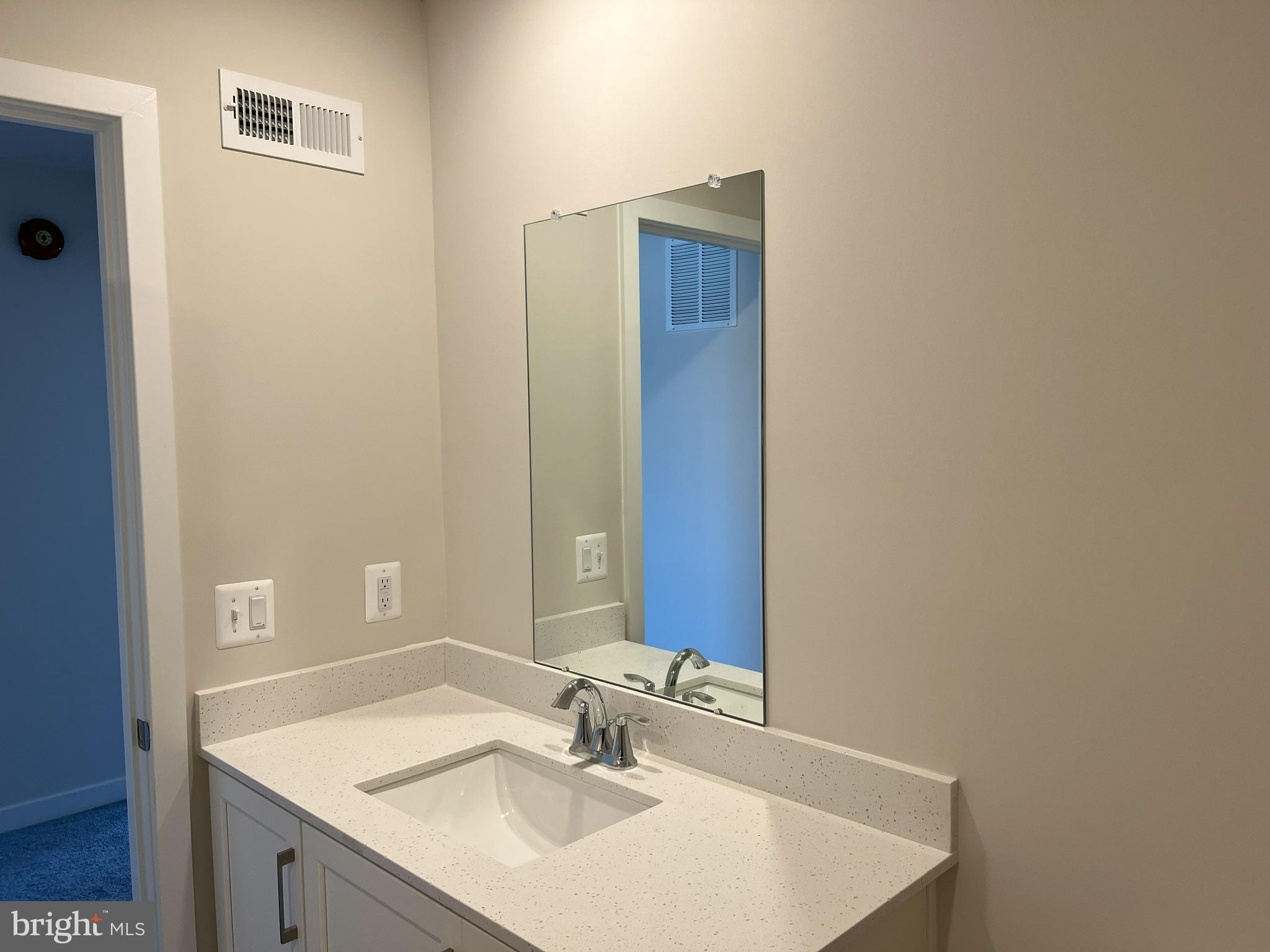 45 Four Leaf Drive Downingtown, PA 19335 - Photo 5 of 16 a bathroom with a sink and a mirror