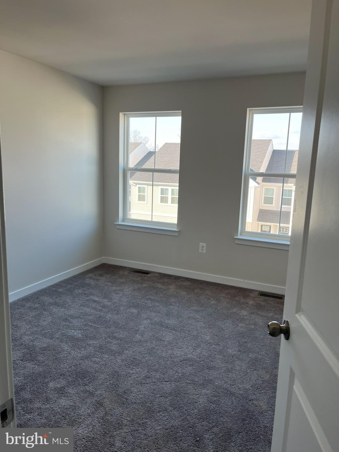 45 Four Leaf Drive Downingtown, PA 19335 - Photo 8 of 16 an empty room with windows