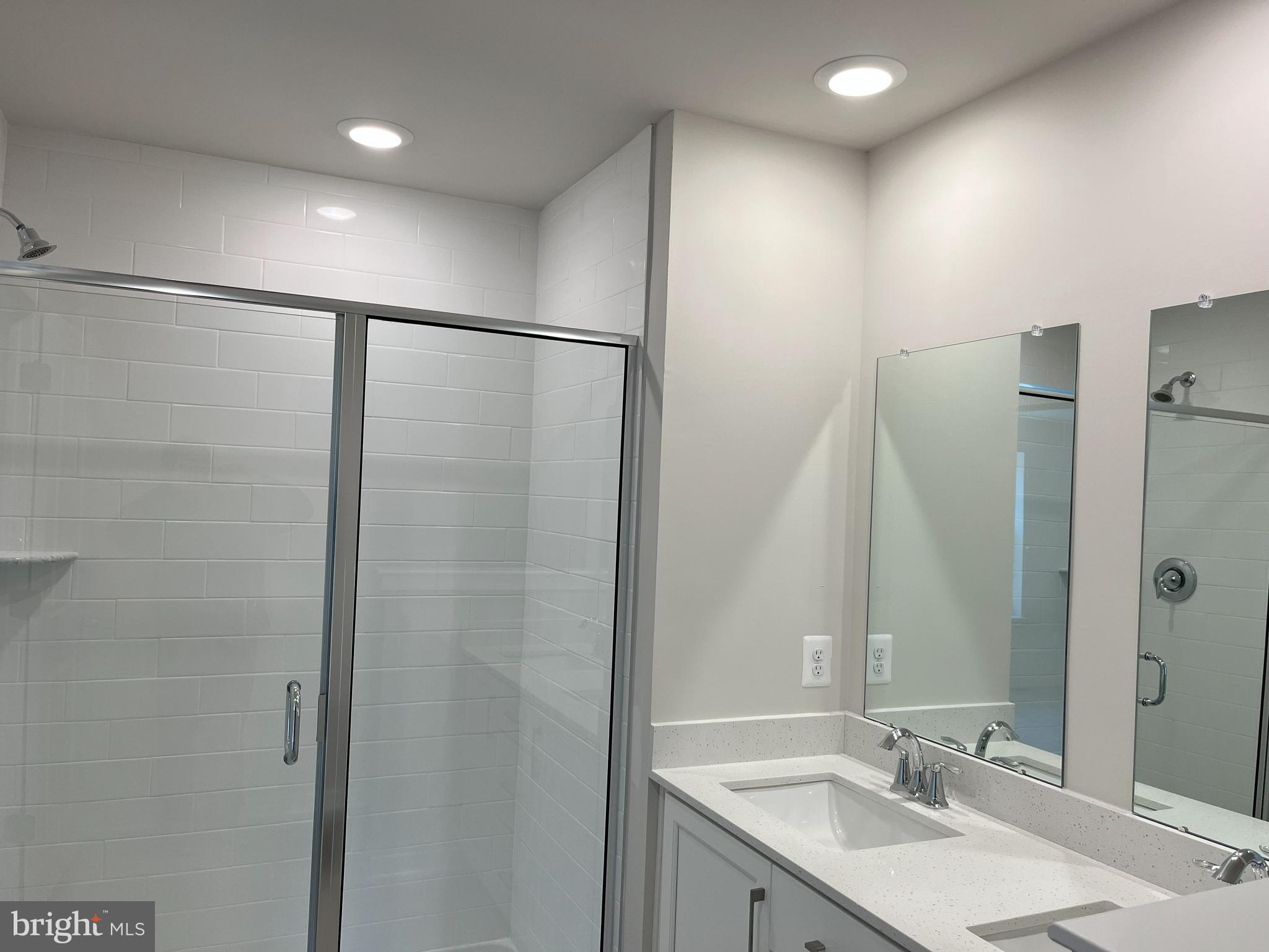 45 Four Leaf Drive Downingtown, PA 19335 - Photo 10 of 16 a bathroom with a sink and a mirror