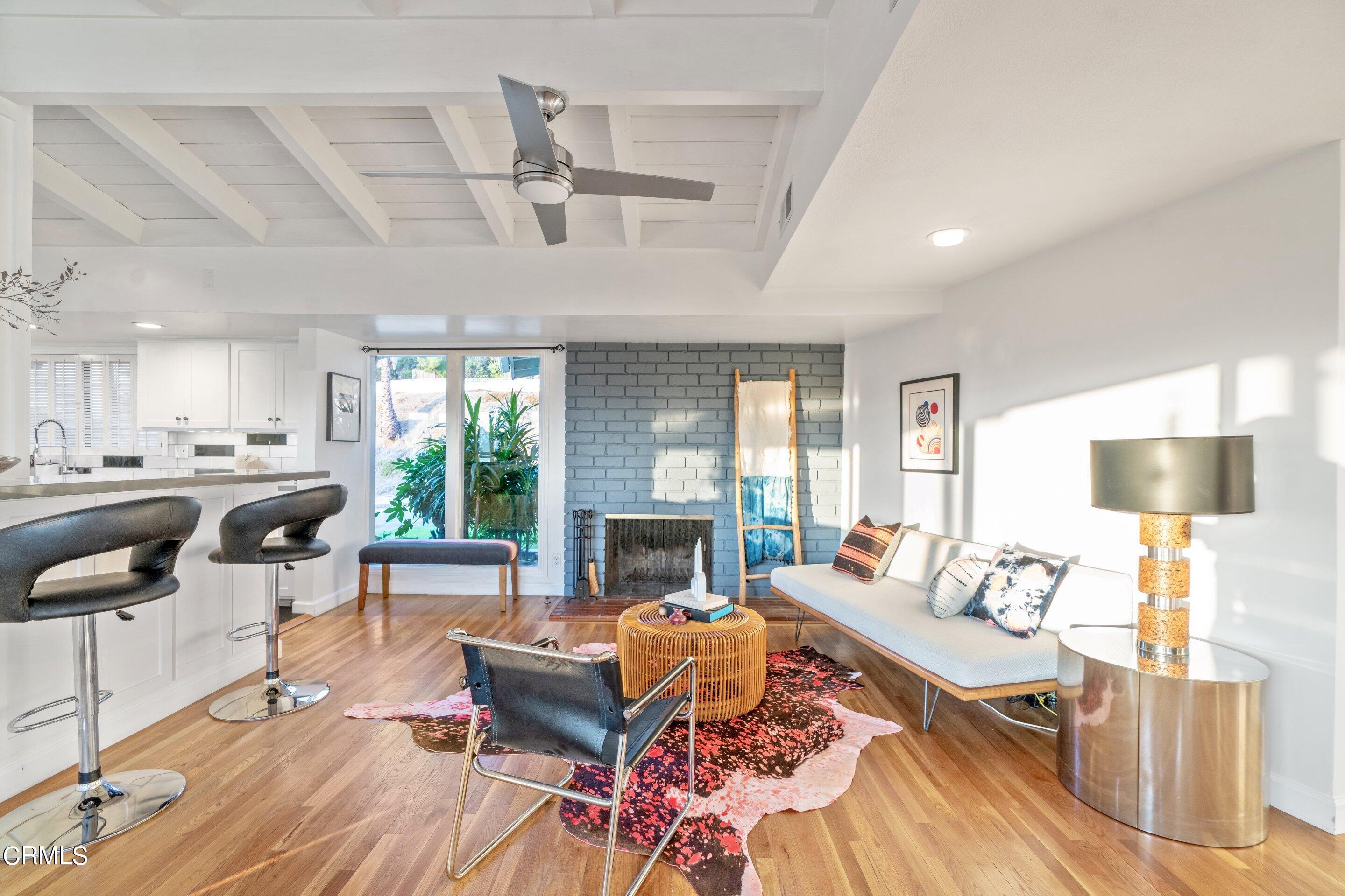 2664 Bogue Drive Glendale, CA 91208 - Photo 11 of 69 a living room with furniture fireplace and window