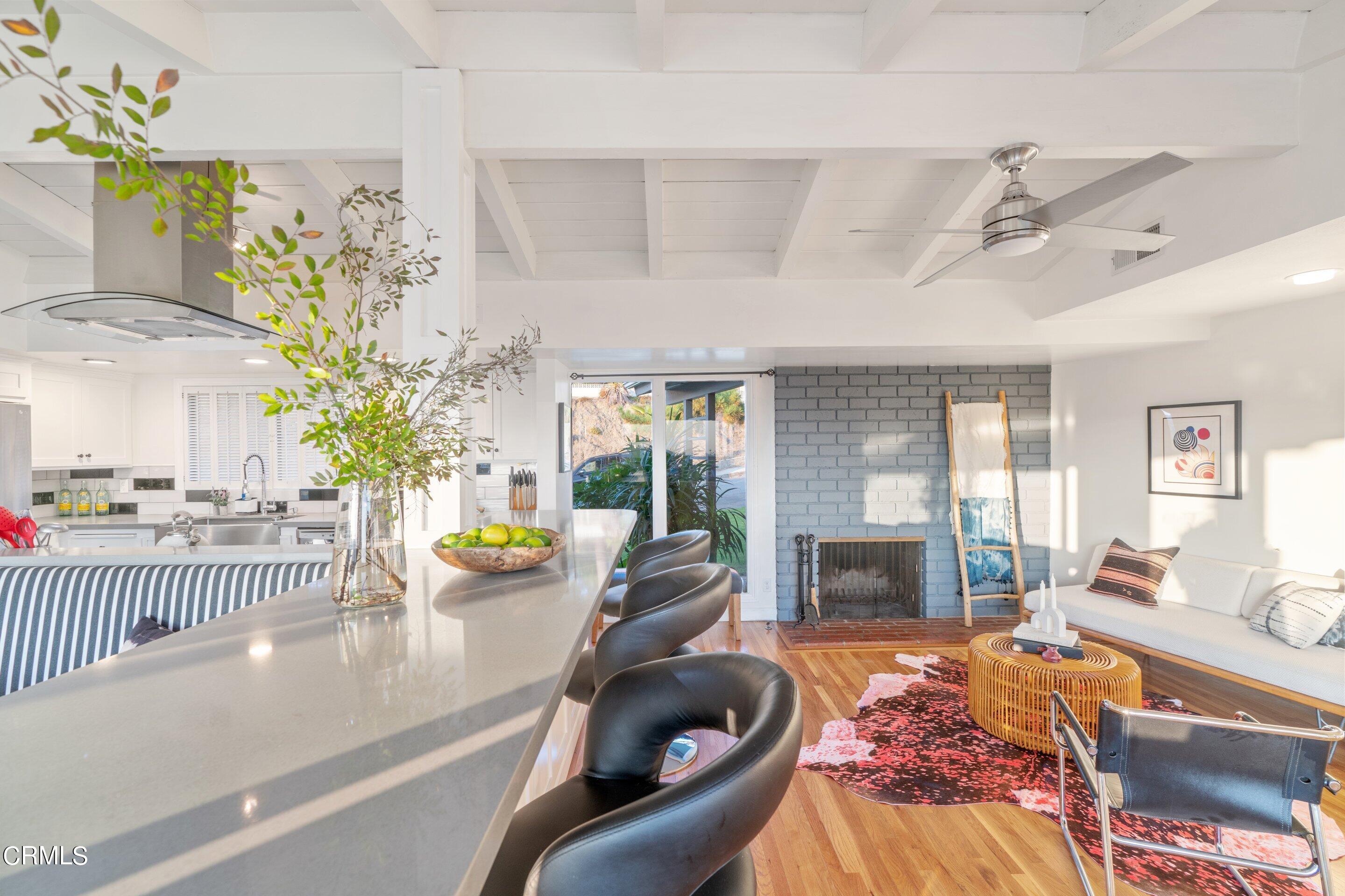2664 Bogue Drive Glendale, CA 91208 - Photo 12 of 69 a living room with furniture and a fireplace