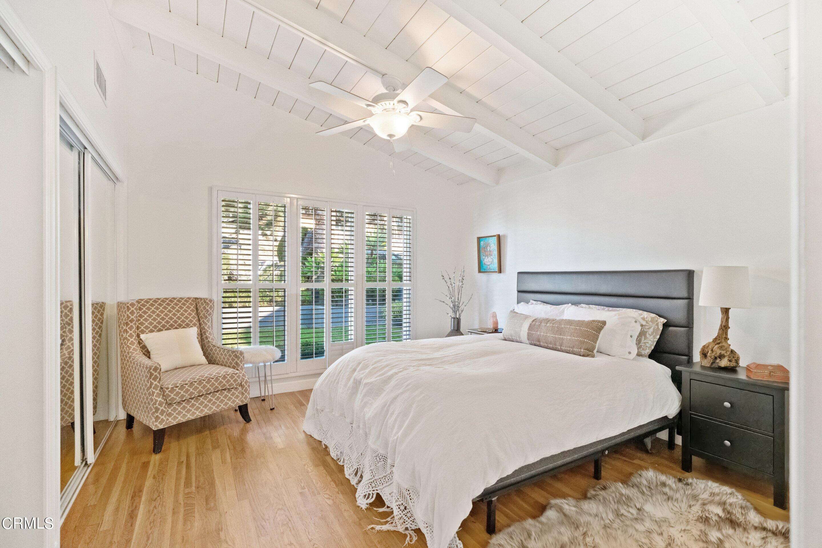 2664 Bogue Drive Glendale, CA 91208 - Photo 42 of 69 a bedroom with a large bed and a large window
