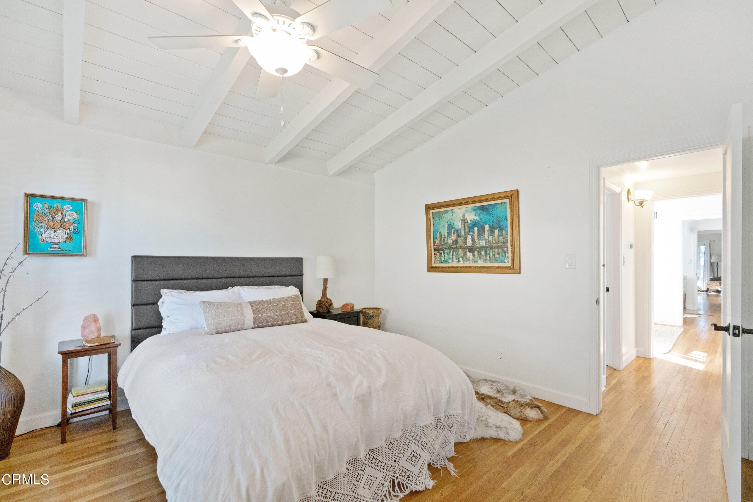 2664 Bogue Drive Glendale, CA 91208 - Photo 43 of 69 a bedroom with a bed and wooden floor