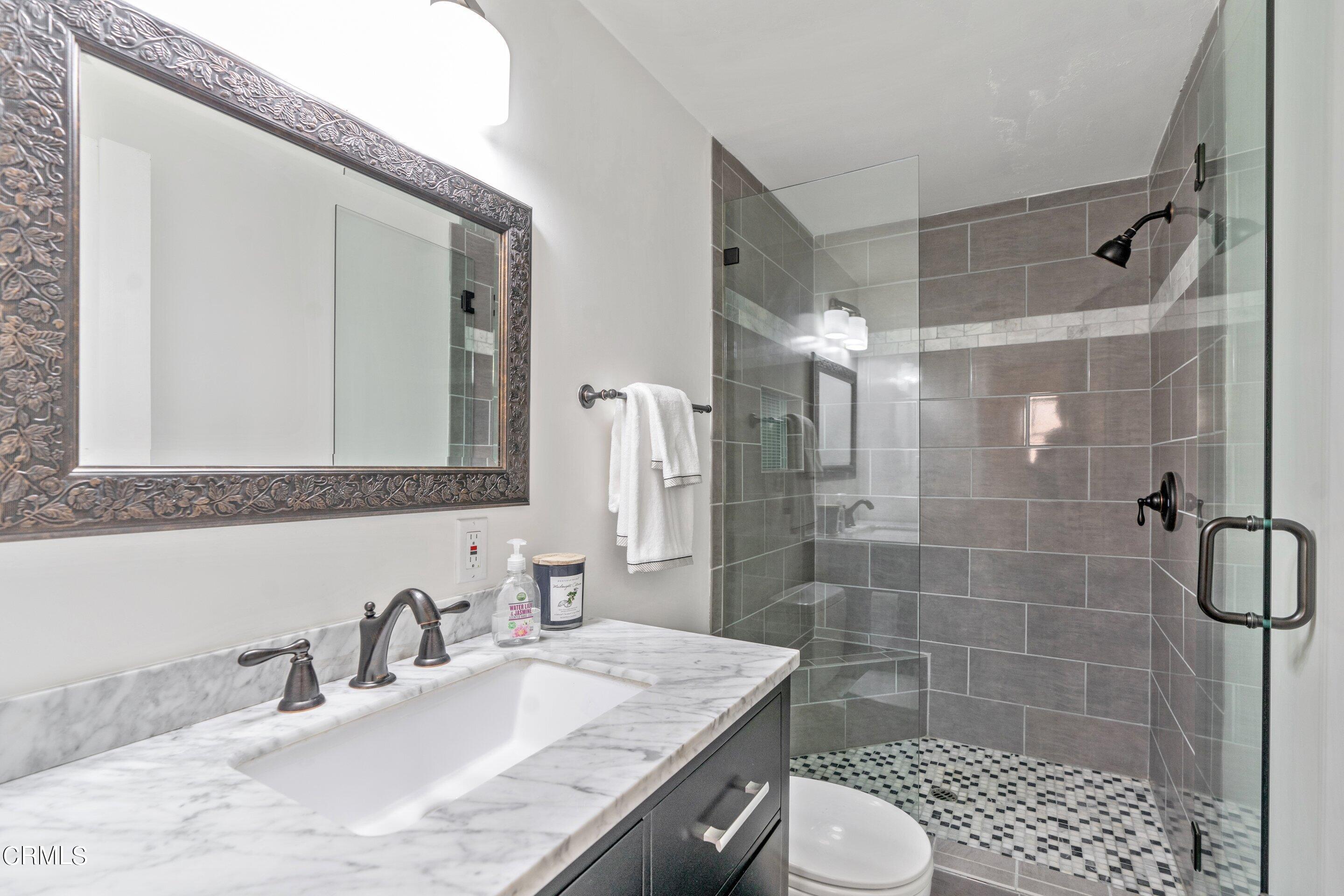 2664 Bogue Drive Glendale, CA 91208 - Photo 52 of 69 a bathroom with a sink toilet and shower