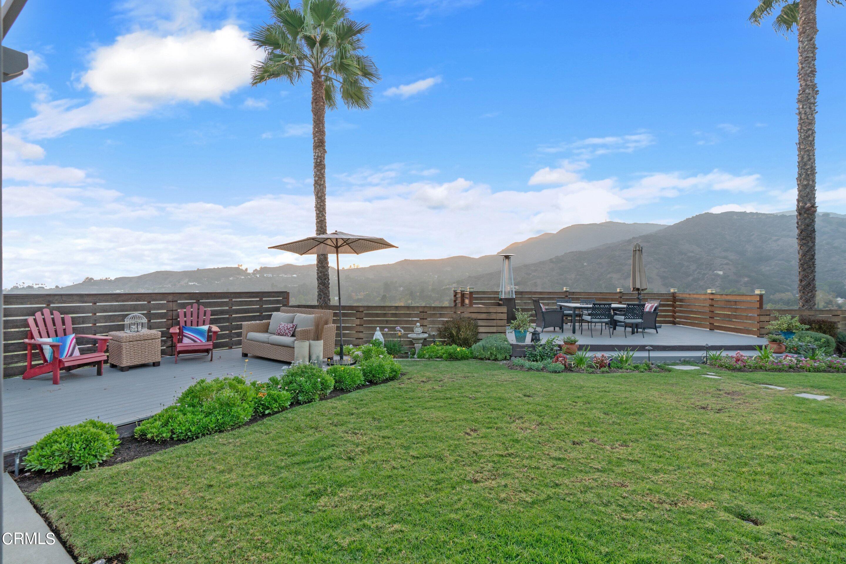 2664 Bogue Drive Glendale, CA 91208 - Photo 56 of 69 a view of a garden with a table and chairs