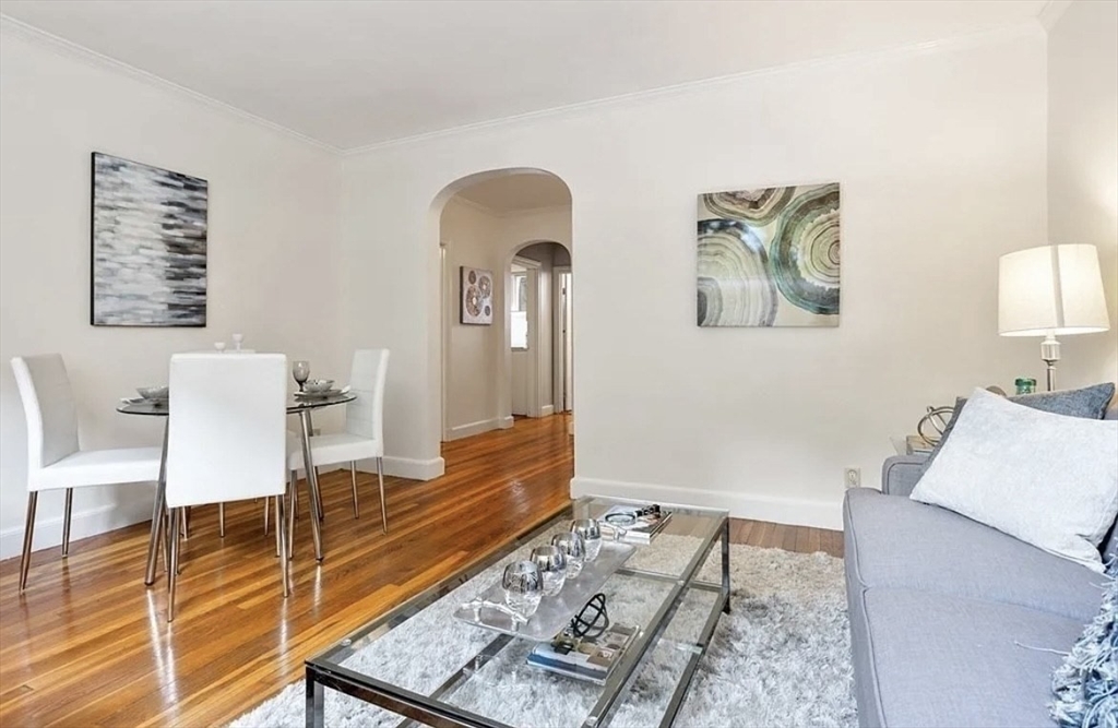 60 Sutherland Road, Unit 1 Boston, MA 02135 - Photo 20 of 21 a living room with furniture