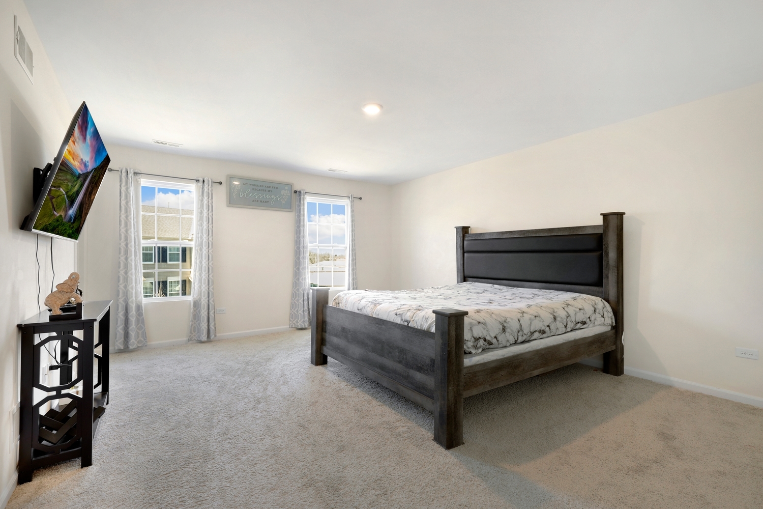 10306 Kerry Ridge Court Chicago Ridge, IL 60415 - Photo 15 of 26 a bedroom with a bed and a flat tv screen on dresser