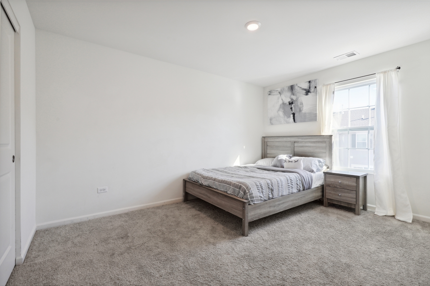 10306 Kerry Ridge Court Chicago Ridge, IL 60415 - Photo 18 of 26 a bedroom with a bed and a window