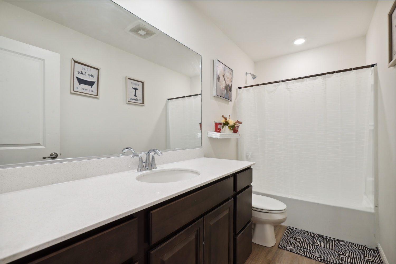 10306 Kerry Ridge Court Chicago Ridge, IL 60415 - Photo 20 of 26 a bathroom with a sink toilet and shower