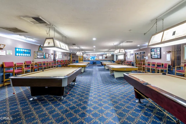 a room with lots of furniture and equipment