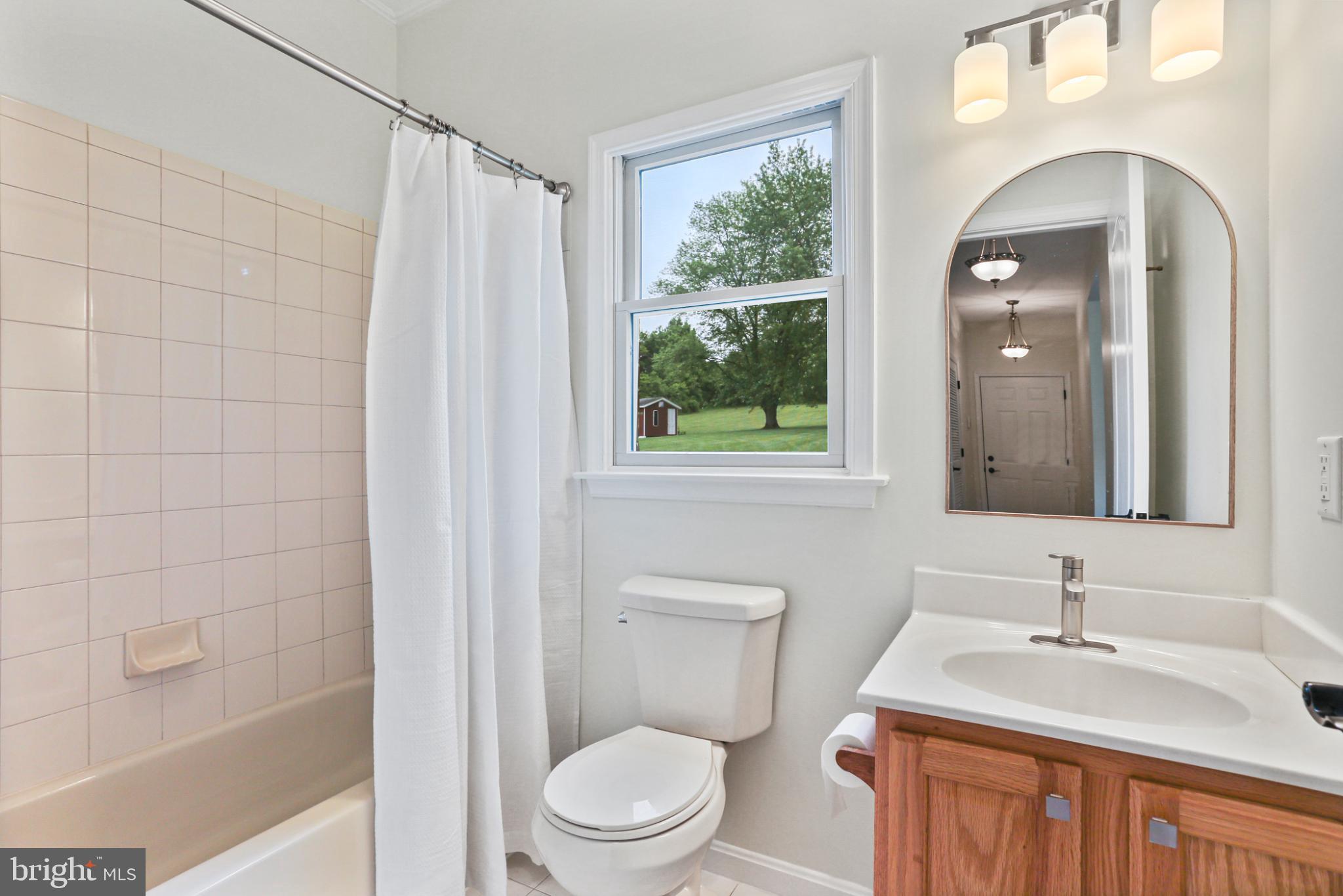 3547 Green Spring Road Havre de Grace, MD 21078 - Photo 12 of 50 a bathroom with a granite countertop sink toilet and shower