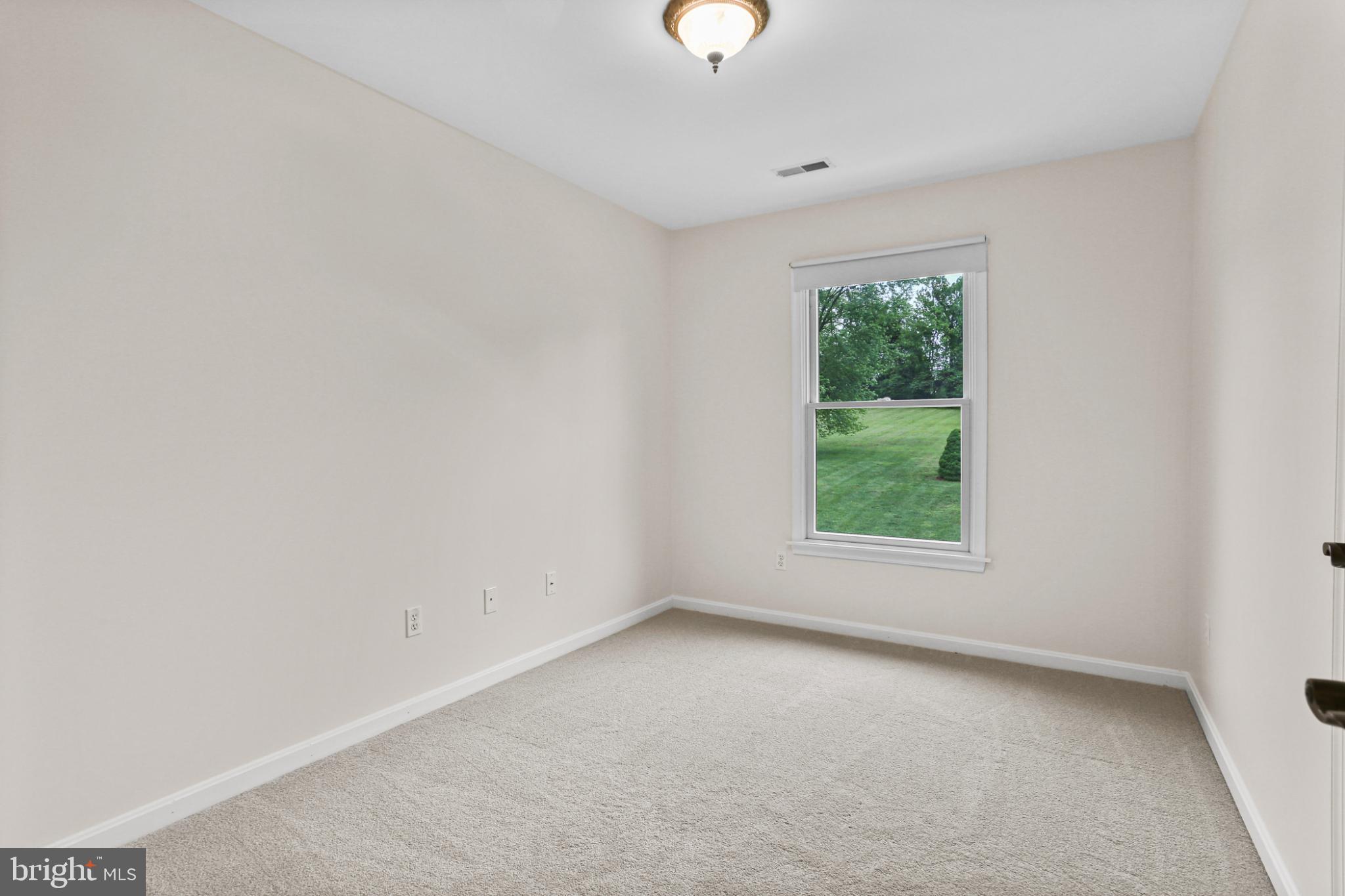 3547 Green Spring Road Havre de Grace, MD 21078 - Photo 21 of 50 an empty room with a window