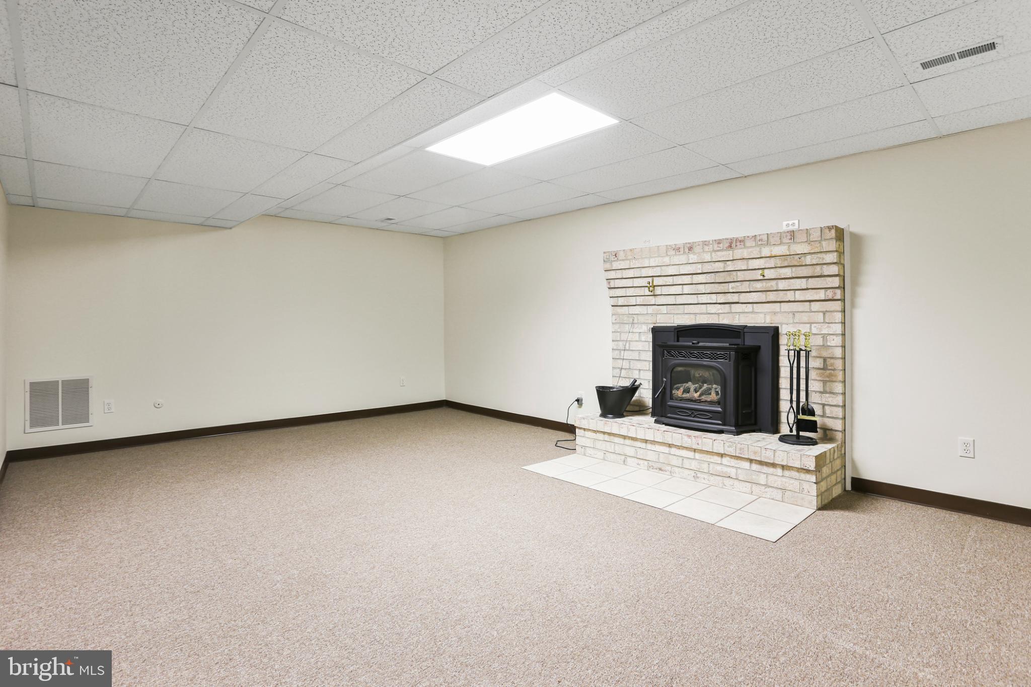 3547 Green Spring Road Havre de Grace, MD 21078 - Photo 22 of 50 a view of empty room with a fireplace