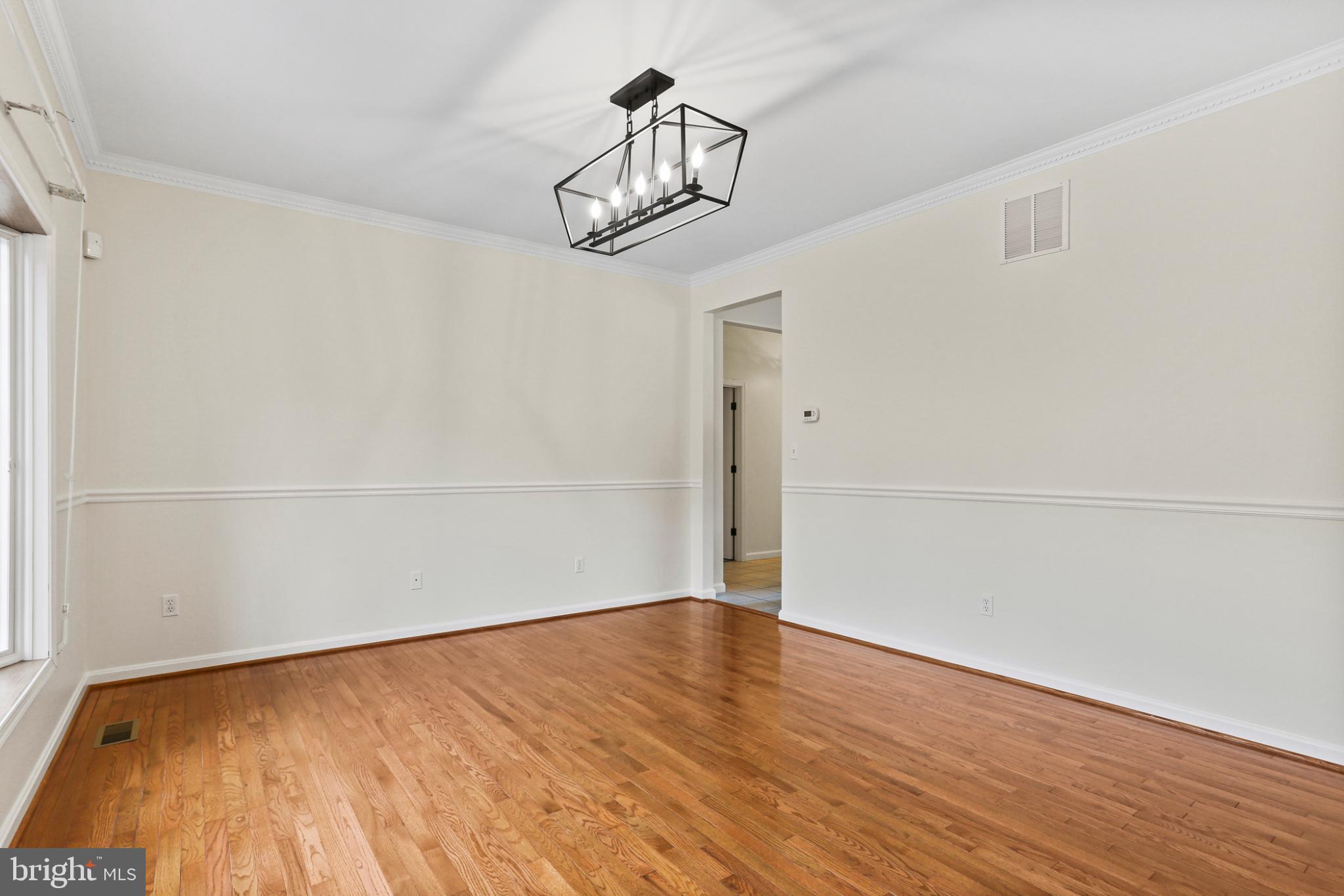 3547 Green Spring Road Havre de Grace, MD 21078 - Photo 3 of 50 a view of a room with wooden floor and white walls