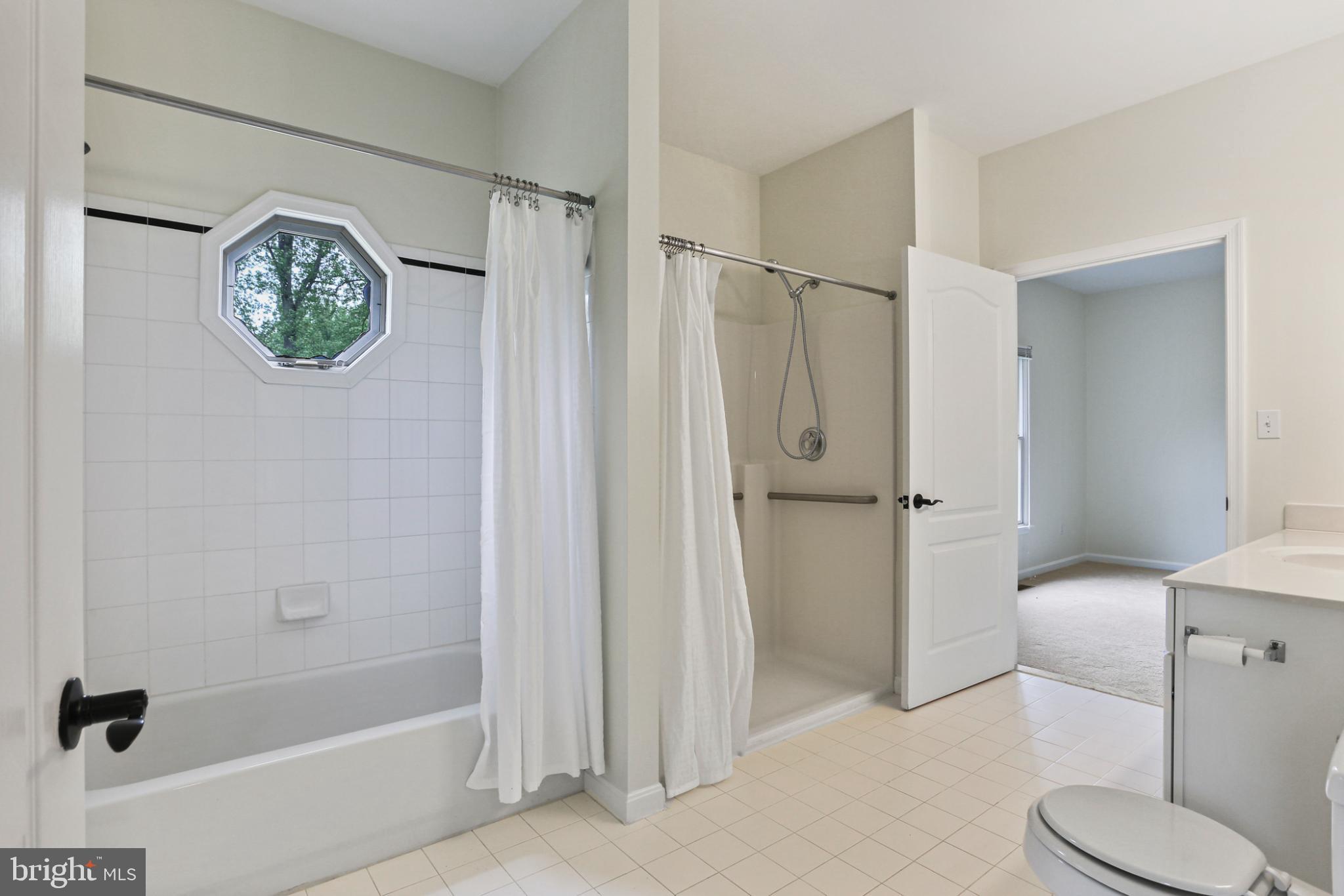 3547 Green Spring Road Havre de Grace, MD 21078 - Photo 37 of 50 a bathroom with a shower a toilet and a bathtub