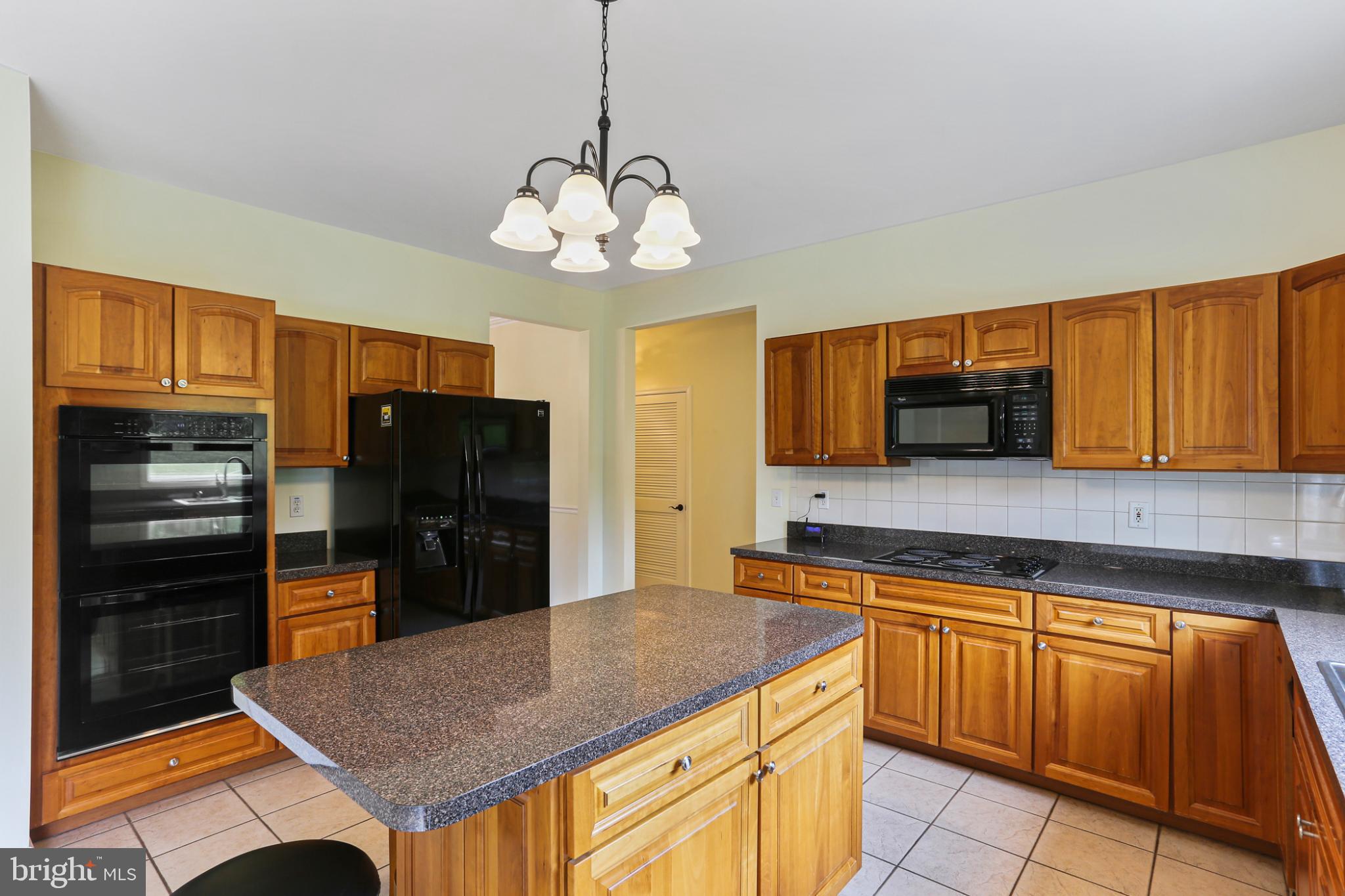 3547 Green Spring Road Havre de Grace, MD 21078 - Photo 7 of 50 a kitchen with stainless steel appliances granite countertop a refrigerator and microwave