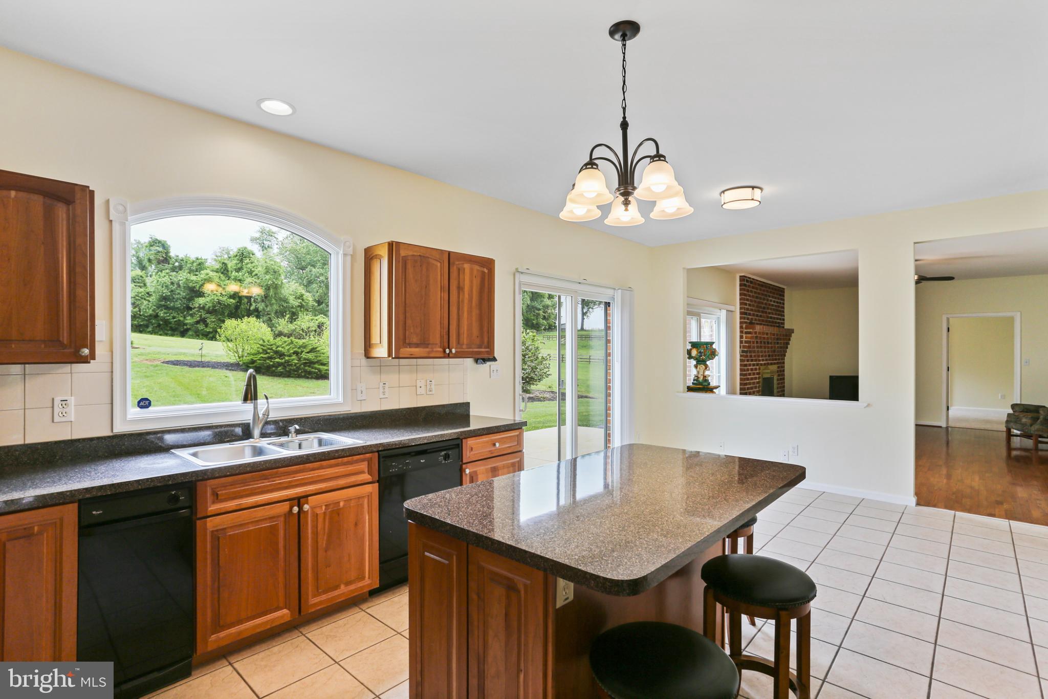 3547 Green Spring Road Havre de Grace, MD 21078 - Photo 8 of 50 a kitchen with a table chairs sink and cabinets