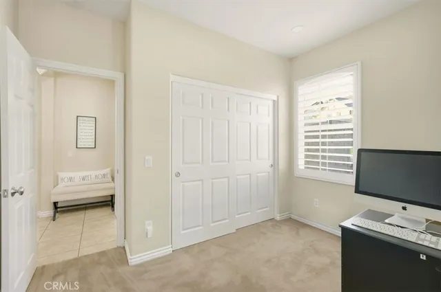 a kitchen with appliances cabinets and furniture