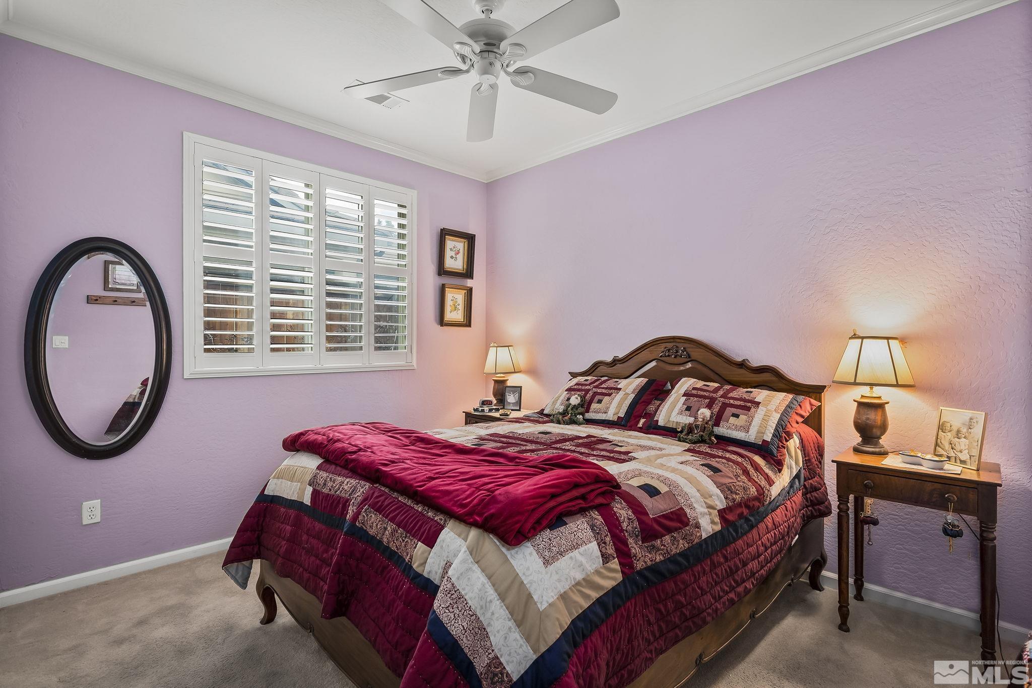 1355 Tarleton Way Reno, NV 89523 - Photo 14 of 40 a bedroom with a bed and a lamp