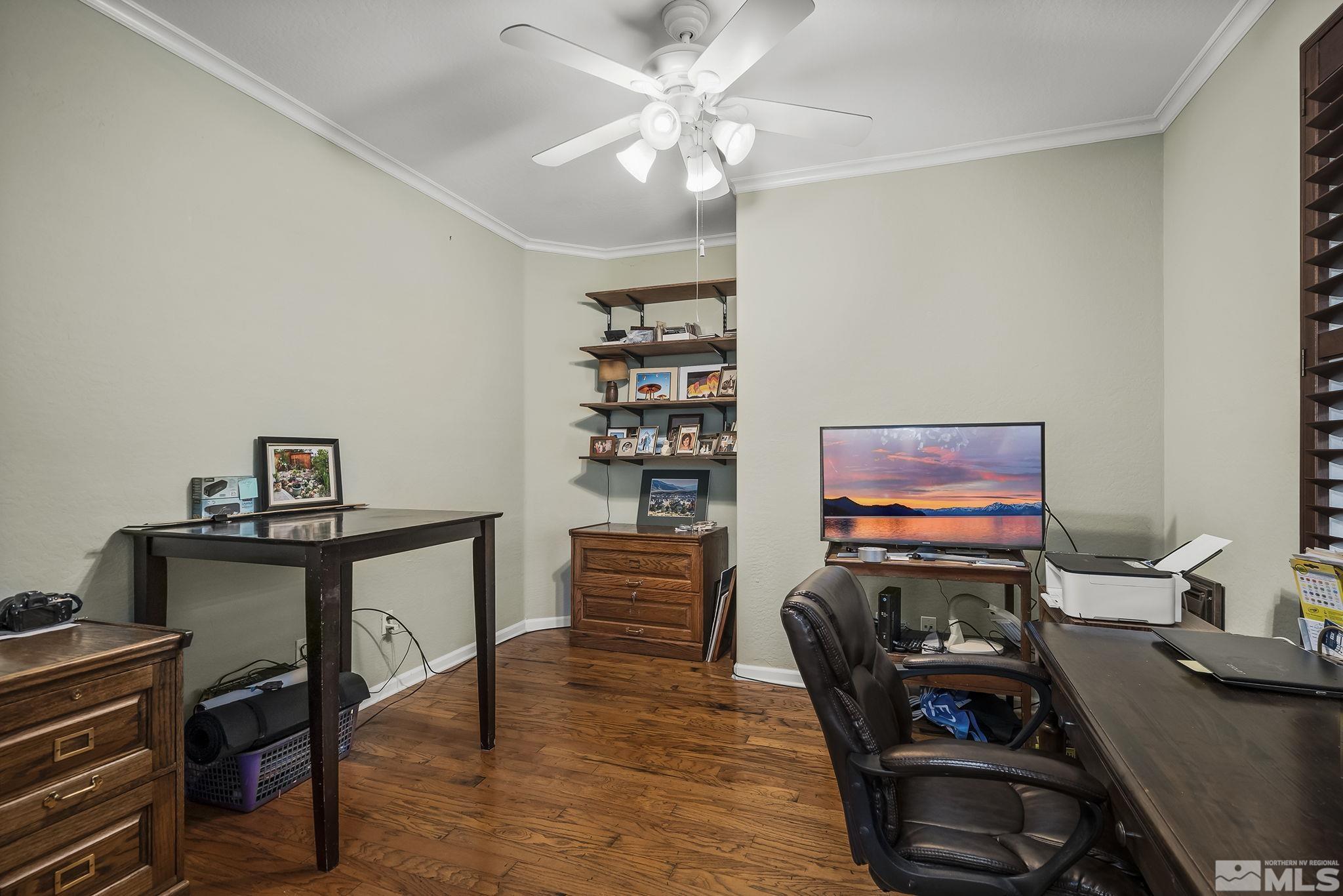 1355 Tarleton Way Reno, NV 89523 - Photo 16 of 40 a view of a workspace with furniture and wooden floor