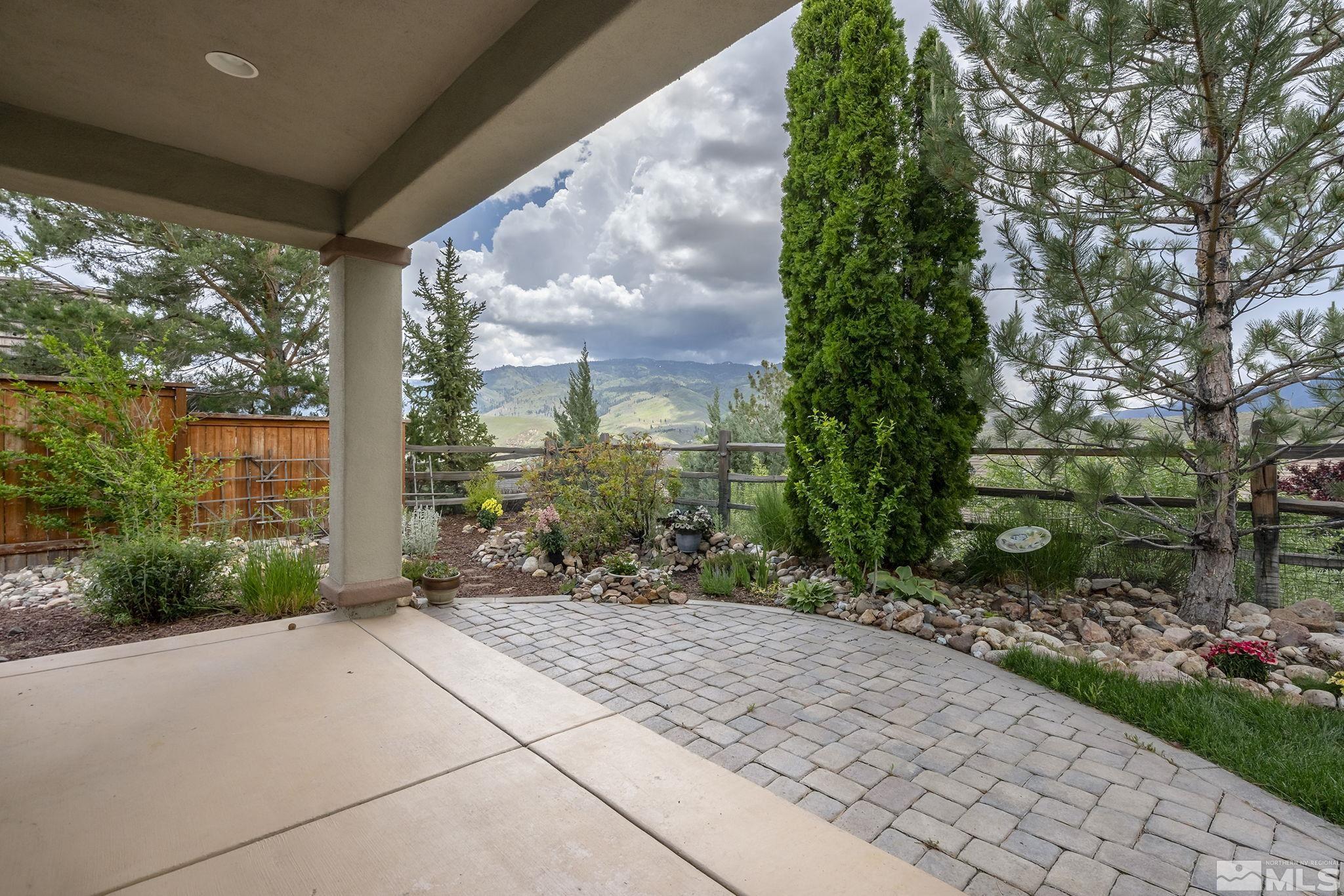 1355 Tarleton Way Reno, NV 89523 - Photo 21 of 40 a front view of a house with a yard and outdoor seating