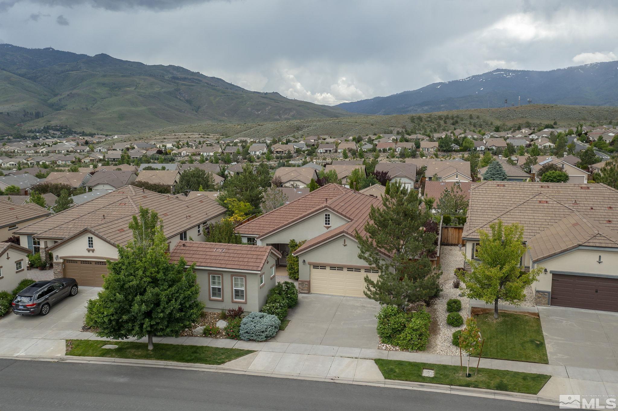 1355 Tarleton Way Reno, NV 89523 - Photo 26 of 40 an aerial view of residential houses with outdoor space and trees