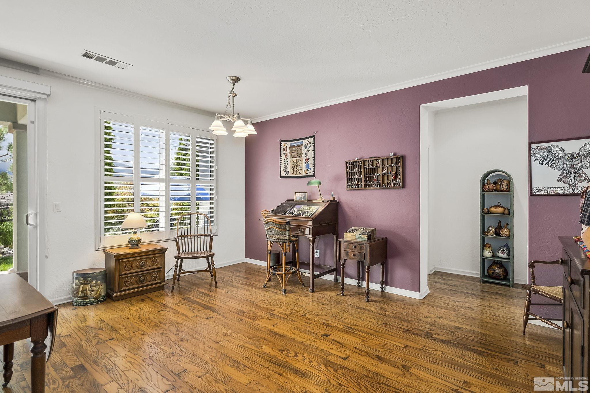 1355 Tarleton Way Reno, NV 89523 - Photo 5 of 40 a view of a livingroom with furniture window and wooden floor