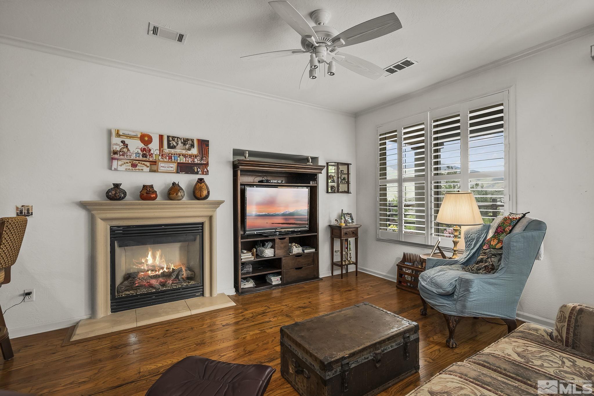 1355 Tarleton Way Reno, NV 89523 - Photo 8 of 40 a living room with furniture and a fireplace