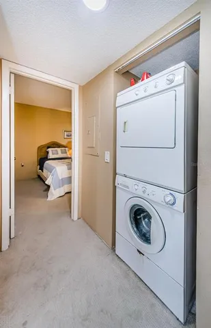 a living room with a couch and a window