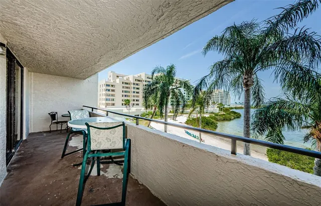a view of a swimming pool with a seating space