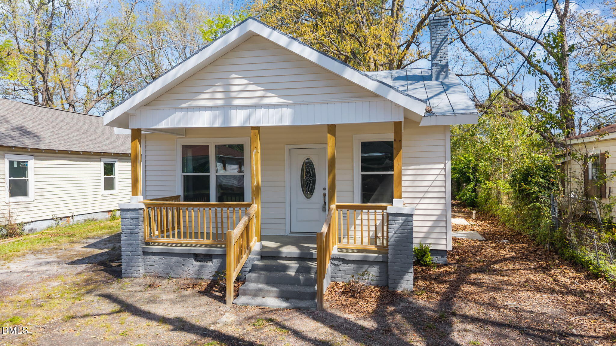 910 Gay Street Rocky Mount, NC 27804 - Photo 1 of 18 a front view of a house with garden