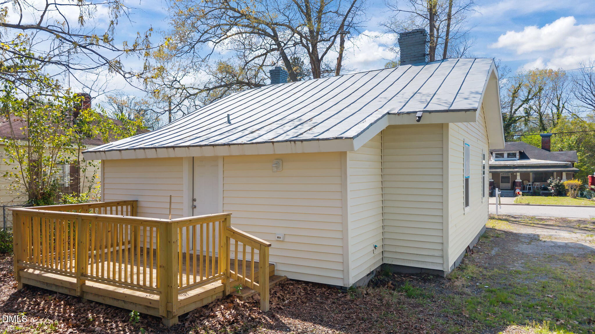 910 Gay Street Rocky Mount, NC 27804 - Photo 15 of 18 a front view of a house with a garden