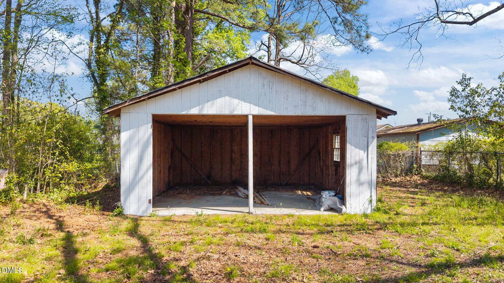 910 Gay Street Rocky Mount, NC 27804 - Photo 17 of 18 a house with trees in front of it