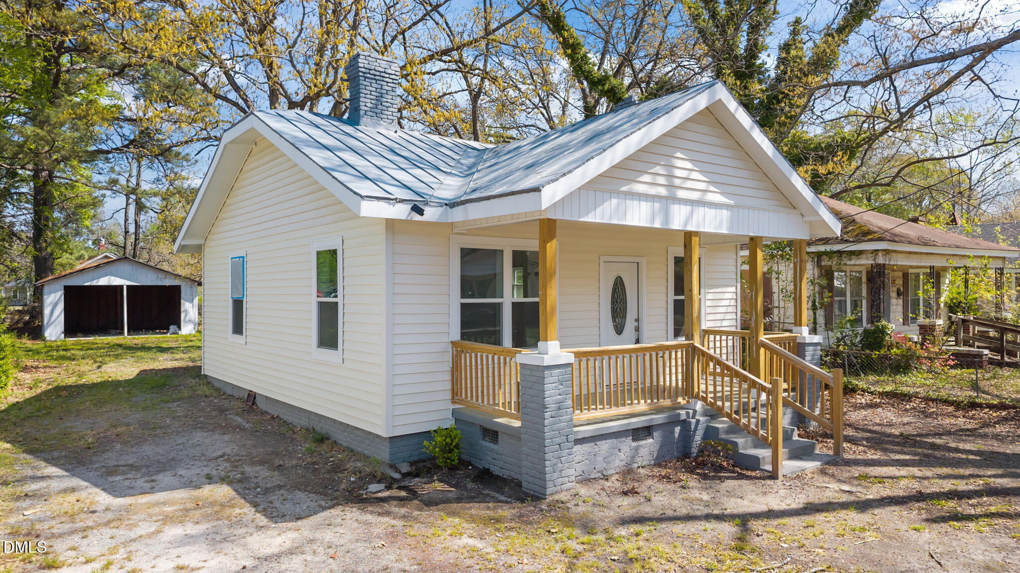 910 Gay Street Rocky Mount, NC 27804 - Photo 2 of 18 a front view of a house with garden