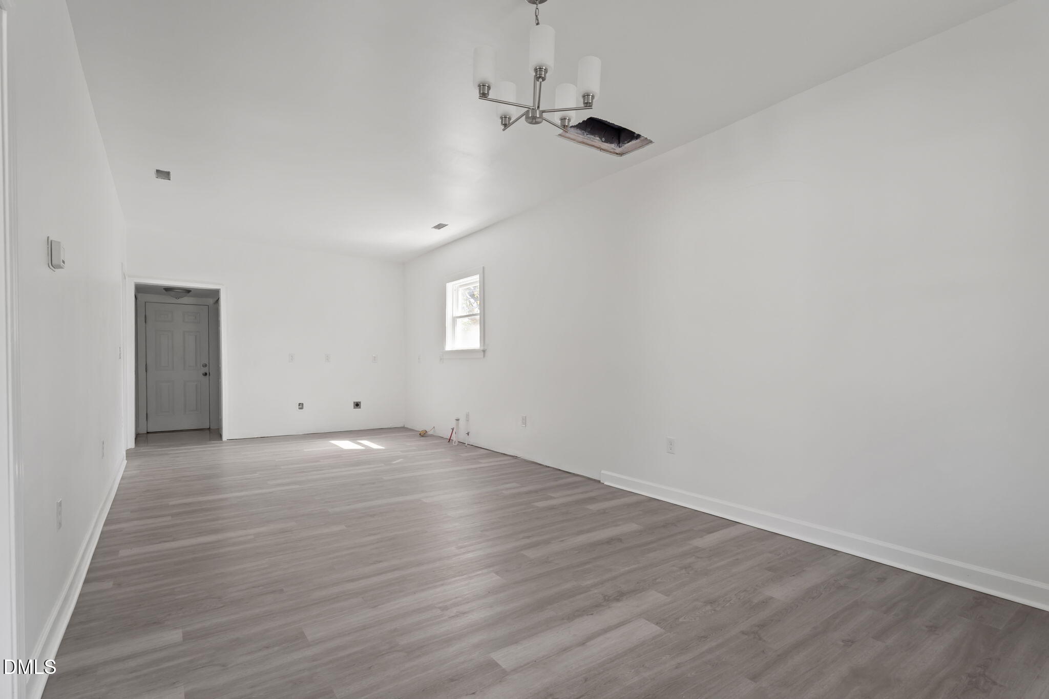 910 Gay Street Rocky Mount, NC 27804 - Photo 3 of 18 a view of an empty room with a window