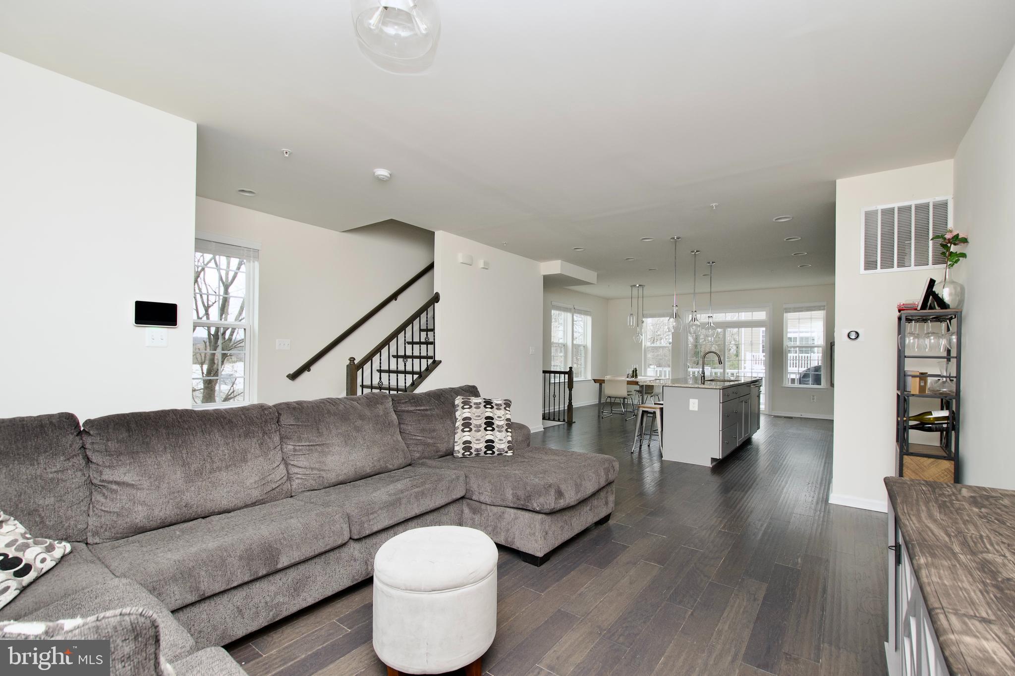 2900 Pinebrook Road Landover, MD 20785 - Photo 21 of 46 a living room with furniture and wooden floor