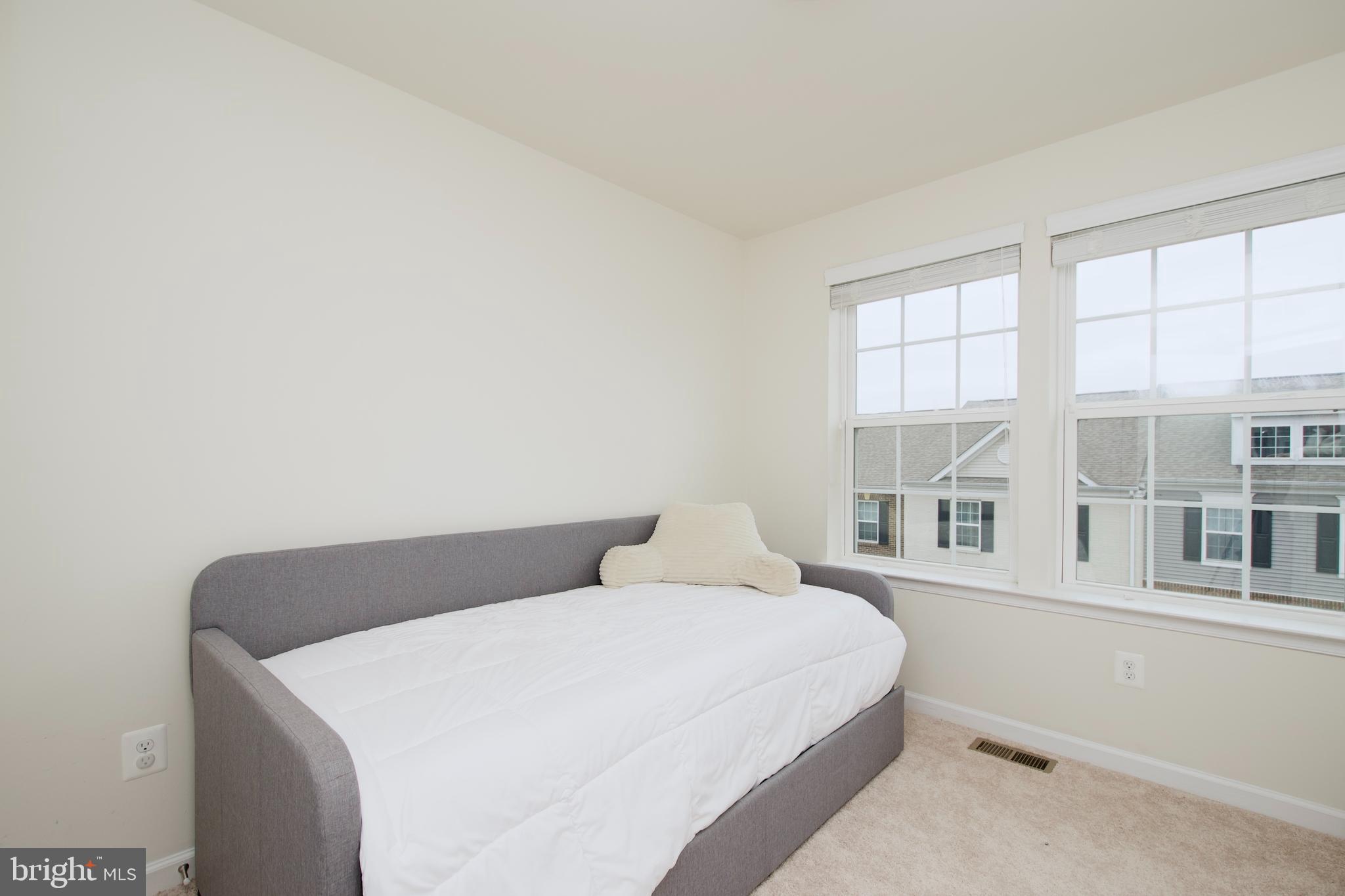 2900 Pinebrook Road Landover, MD 20785 - Photo 37 of 46 a bedroom with a bed and a window