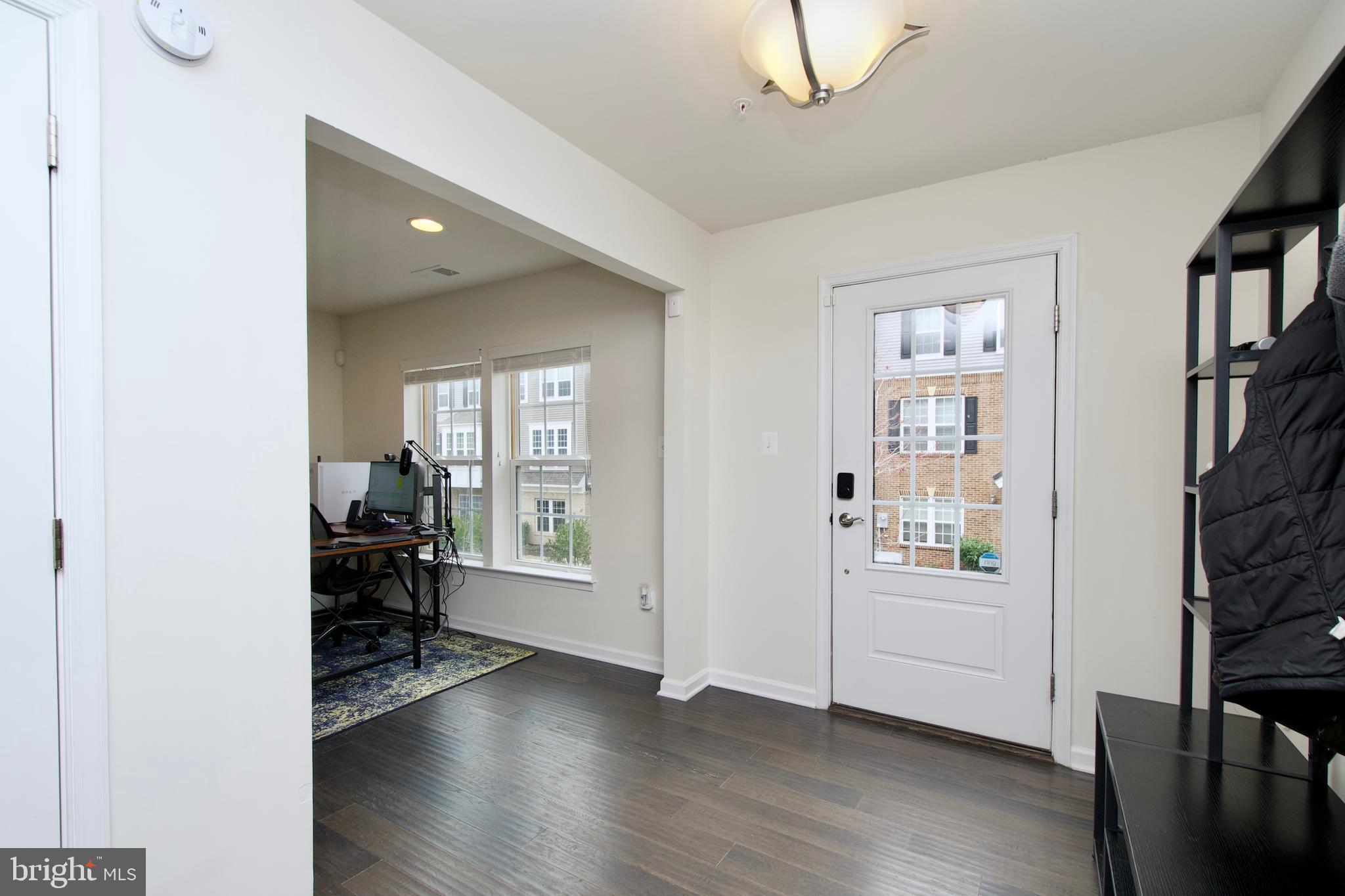 2900 Pinebrook Road Landover, MD 20785 - Photo 4 of 46 a view of a room with wooden floor and windows