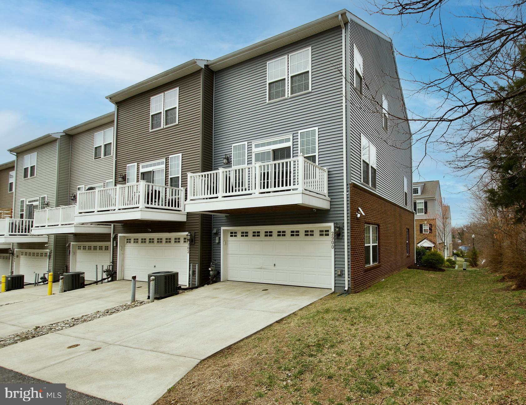 2900 Pinebrook Road Landover, MD 20785 - Photo 40 of 46 a front view of a house with a yard