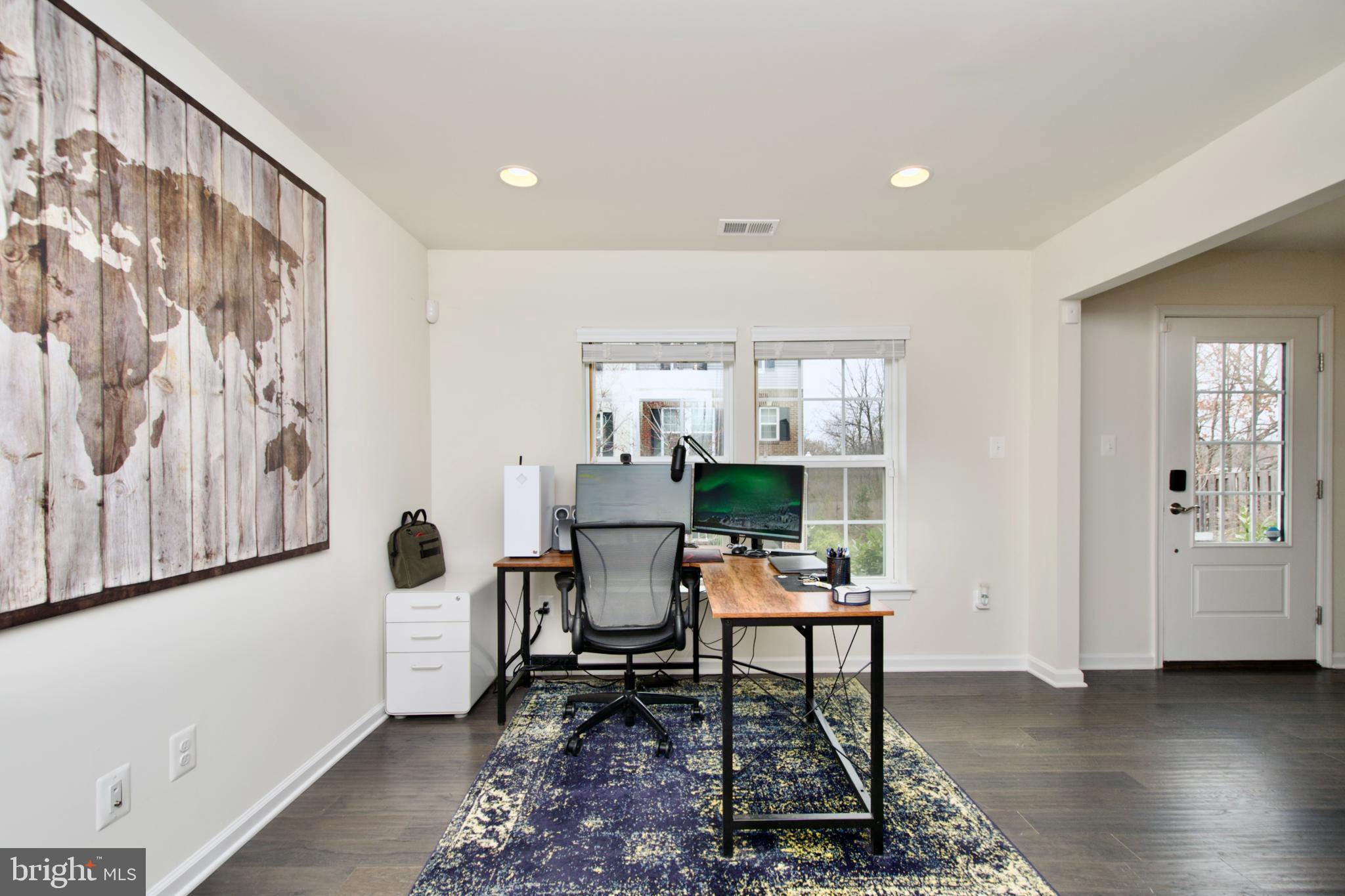 2900 Pinebrook Road Landover, MD 20785 - Photo 7 of 46 a living room with furniture and wooden floor