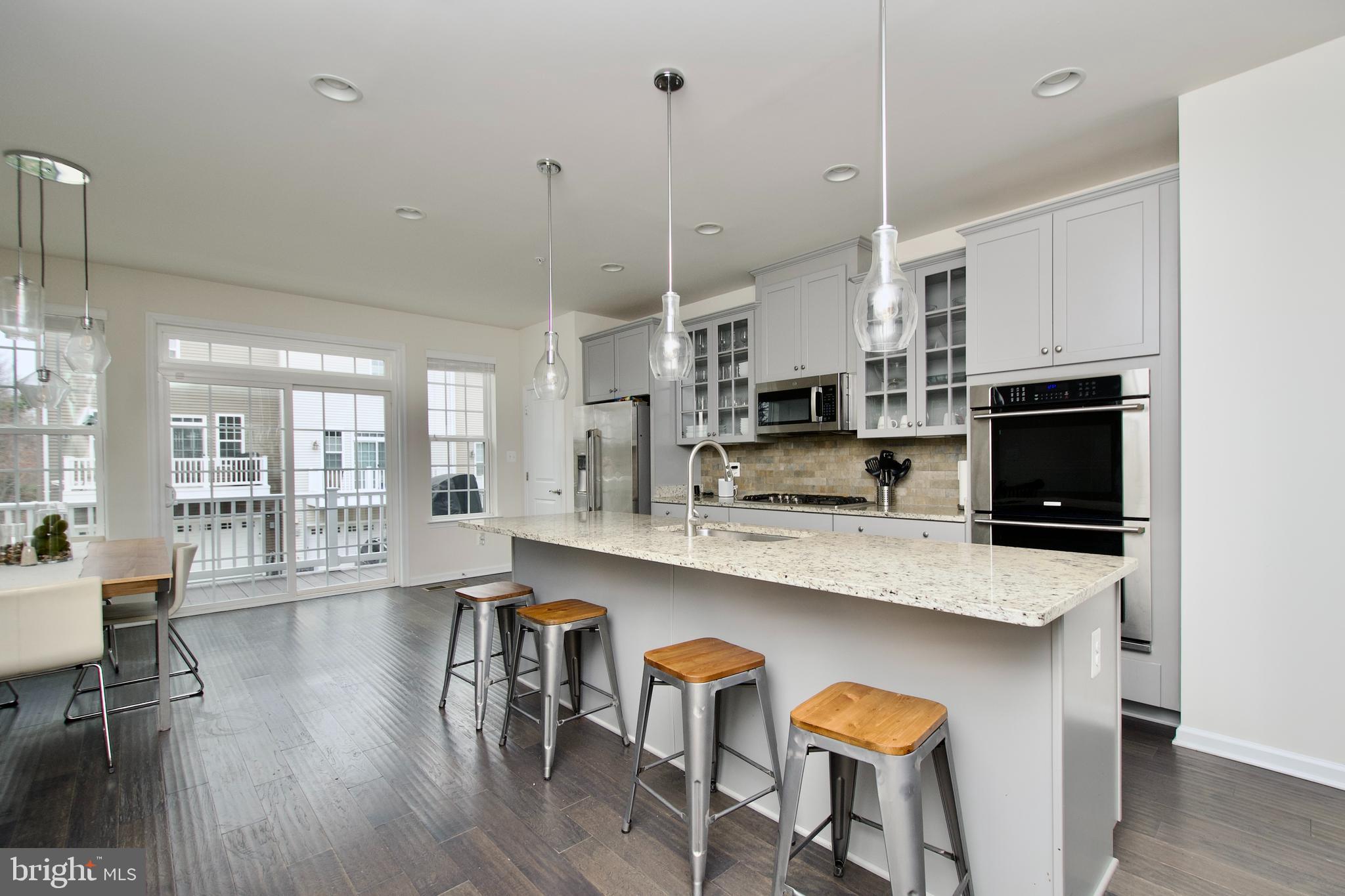 2900 Pinebrook Road Landover, MD 20785 - Photo 46 of 46 a large kitchen with stainless steel appliances lots of counter space and breakfast area