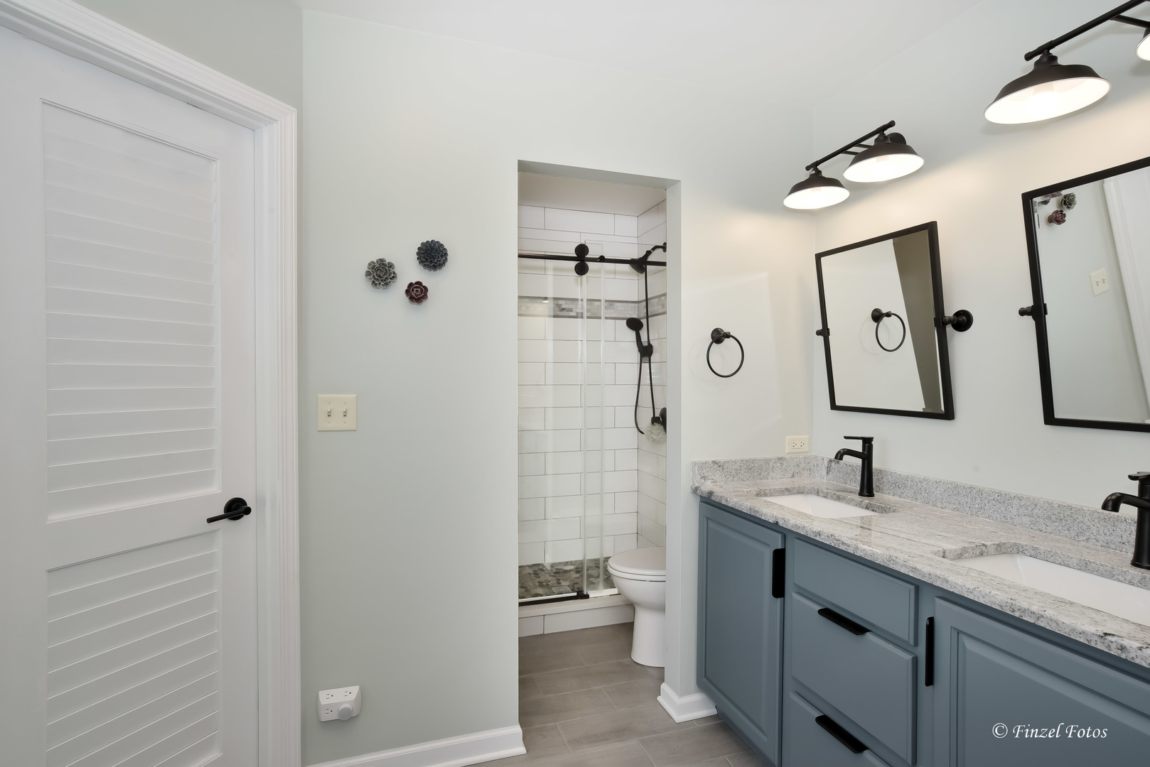 7446 Alexandra Lane Union, IL 60180 - Photo 12 of 22 a bathroom with a double vanity sink mirror and shower