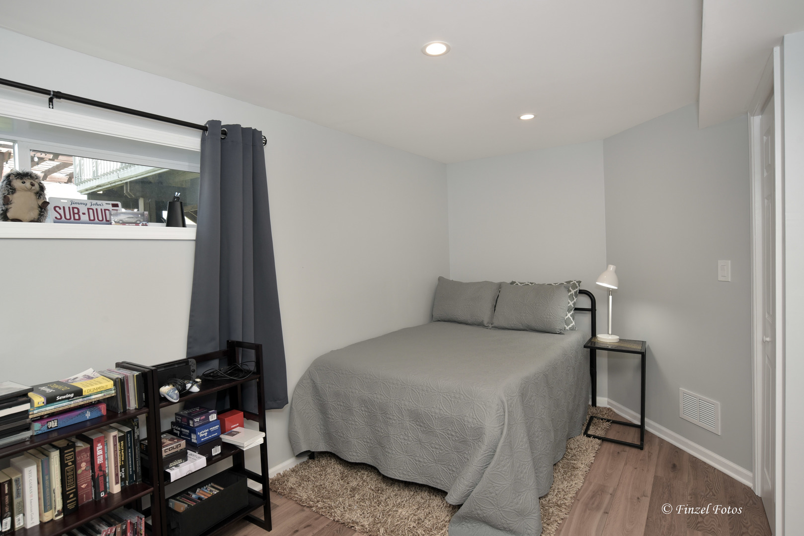 7446 Alexandra Lane Union, IL 60180 - Photo 16 of 22 a bedroom with a bed and wooden floor