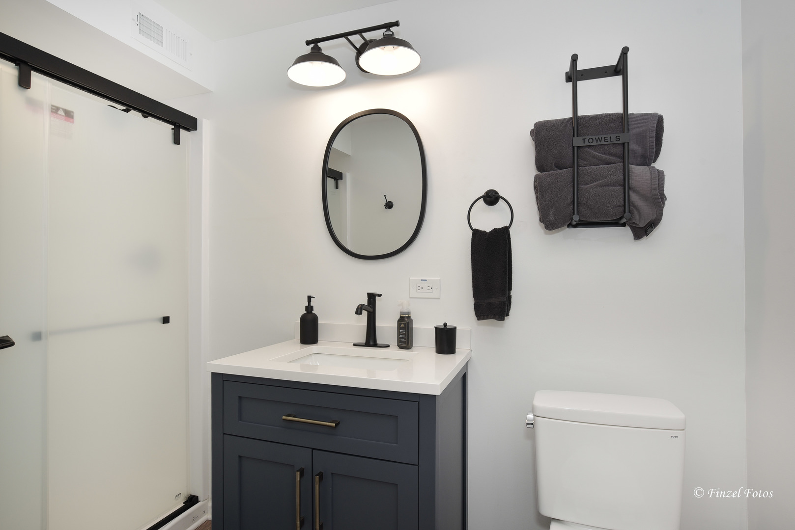 7446 Alexandra Lane Union, IL 60180 - Photo 17 of 22 a bathroom with a toilet sink and mirror