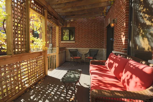 a view of a dinning table and chairs in the patio
