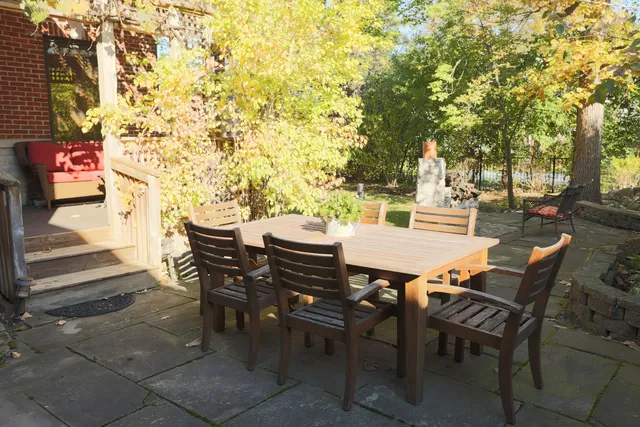 a view of a chairs and tables in the patio