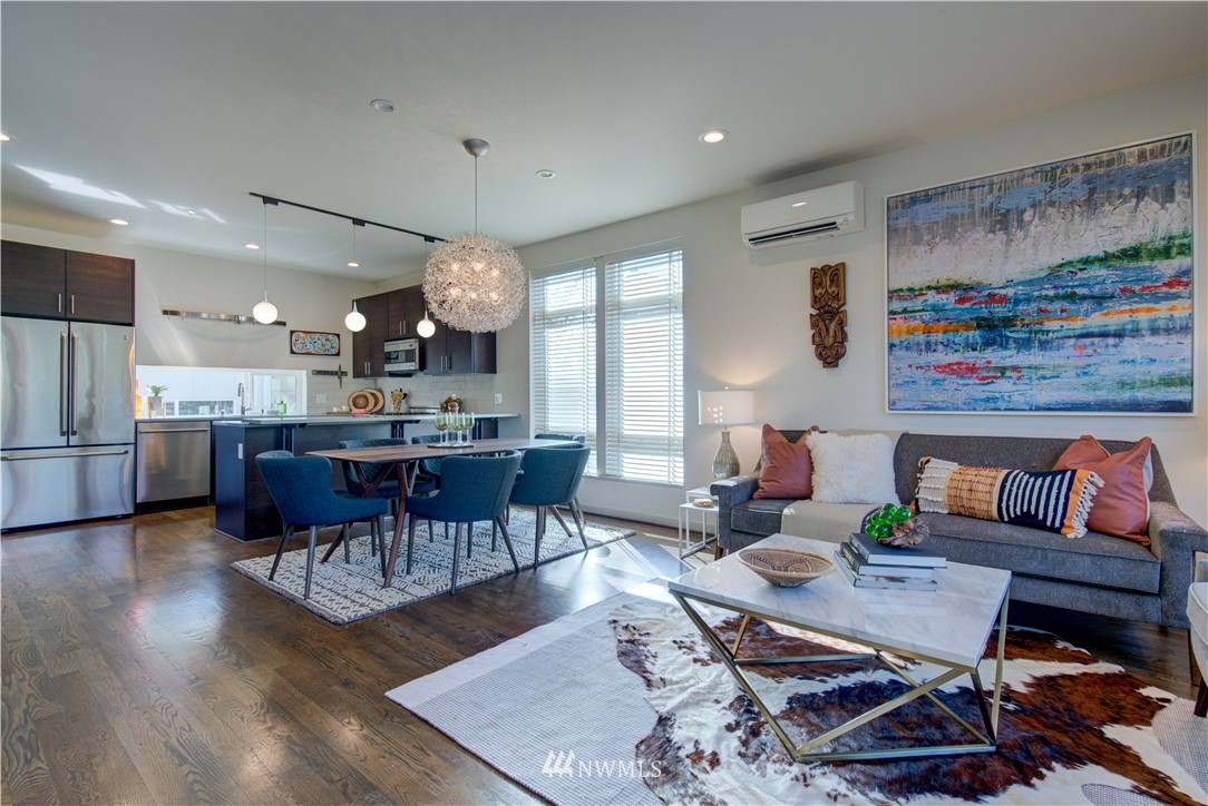 4262 Linden Avenue North Seattle, WA 98103 - Photo 19 of 40 a living room with furniture and kitchen view